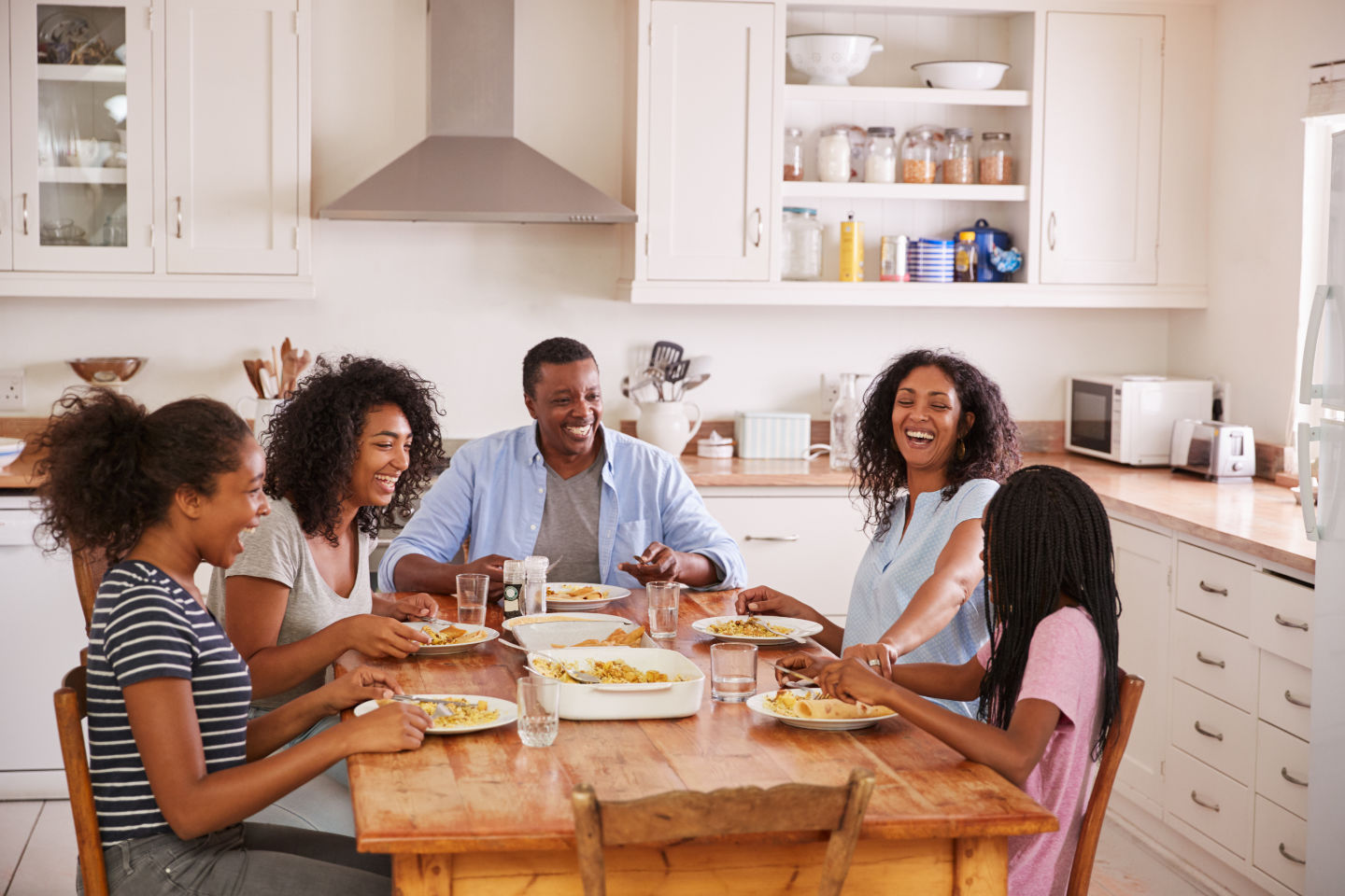 Family eating together at the dinner table