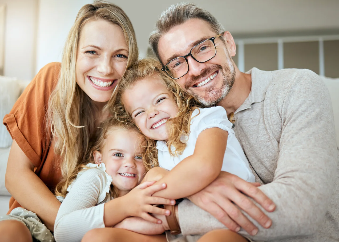 Family working together on household chores in the kitchen
